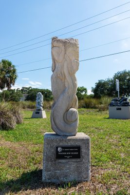 Thacker Bow Figures, limestone sculpture front view of two mermaids.
