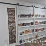 Gallery 5 - Historic Zora Neale Hurston Home Library wall with books available to read.