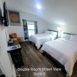 Gallery 7 - Historic Zora Neale Hurston Home Suite with double beds available to guests.