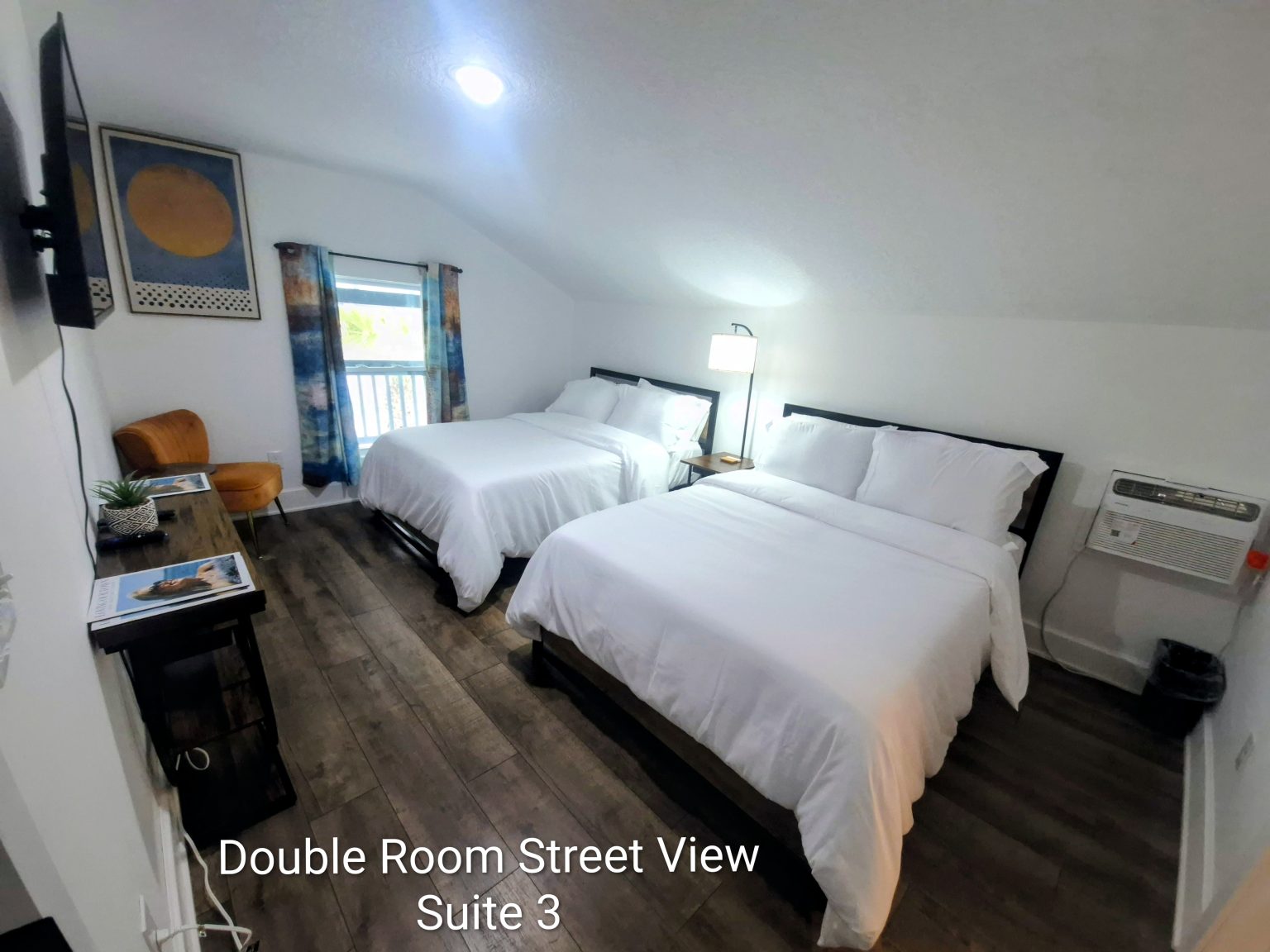 Gallery 7 - Historic Zora Neale Hurston Home Suite with double beds available to guests.