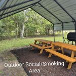 Gallery 10 - Covered outdoor area with picnic table and smoker.