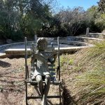 Gallery 2 - Bronze sculpture of a girl reading a story. The sculpture sits at the entrance of the storytelling amphitheatre.